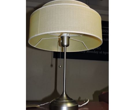 A retro style satin metal table lamp.