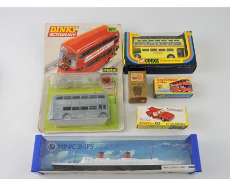 A collection of Corgi, Dinky and other die cast vehicles including a 'Action Kit' Routemaster bus and a Minic RMS Queen Eliza