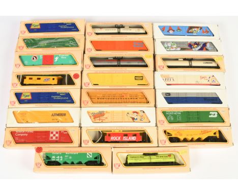 IHC HO. Group of boxed freight wagons. To include "Fischer's" Box Car, "EXXon" Bogie Tank, "Rock Island" Caboose, plus others