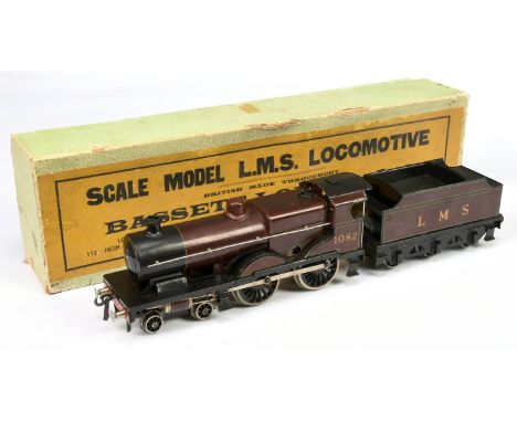 Bassett Lowke O Gauge 4-4-0 Loco and Tender LMS maroon "Compound" No. 1082, clockwork. Condition is Fair to Good Plus in gene