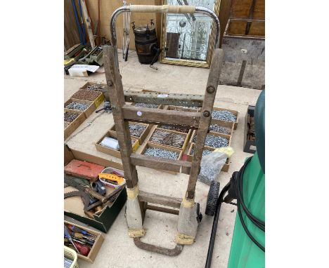 A VINTAGE WOODEN SACK TRUCK IN WORKING ORDER 