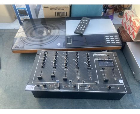 A BANG AND OULFSEN RECORD PLAYER AND A NUMARK PREAMP MIXER BELIEVED IN WORKING ORDER BUT NO WARRANTY 