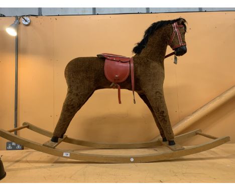 A VINTAGE CHILD'S ROCKING HORSE 