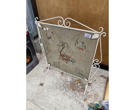 AN ORNATE VINTAGE FIRESCREEN DEPICTING VARIOUS ANIMALS 