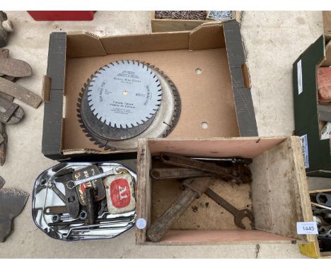 AN ASSORTMENT OF HAND TOOLS TO INCLUDE ADJUSTABLE SPANNERS, CUTTING DISCS ETC 