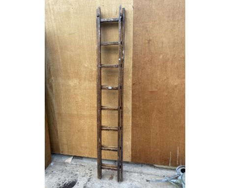 A VINTAGE WOODEN EXTENDABLE LADDER 