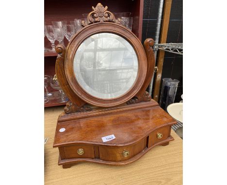 A VINTAGE DRESSING TABLE MIRROR INCLOSING THREE SMALL DRAWERS 