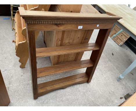 AN OPEN MAHOGANY SHELF WITH DENTIL CORNICE 