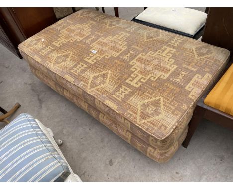 A MODERN POUFFE ON TURNED LEGS, 53x30" 