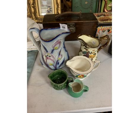A COLLECTION OF VARIOUS CERAMIC JUGS 