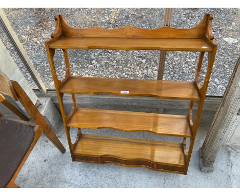 A BEVAN FUNNELL FOUR TIER WALL SHELF WITH THREE DRAWERS TO THE LOWER PORTION 