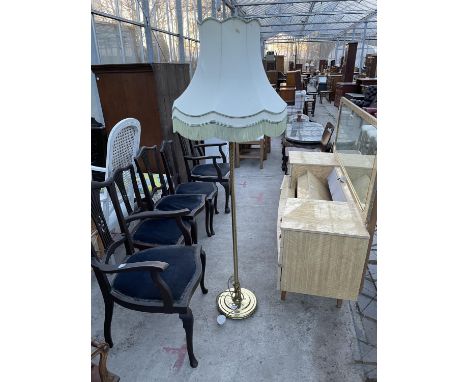 A MODERN BRASS STANDARD LAMP COMPLETE WITH SHADE 
