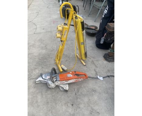 A HUSQVARNA ELECTRIC GRINDER AND A FURTHER WORK LIGHT RIG 