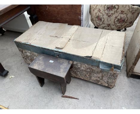 A PAINTED TRUNK AND CONTENTS AND SMALL STOOL 