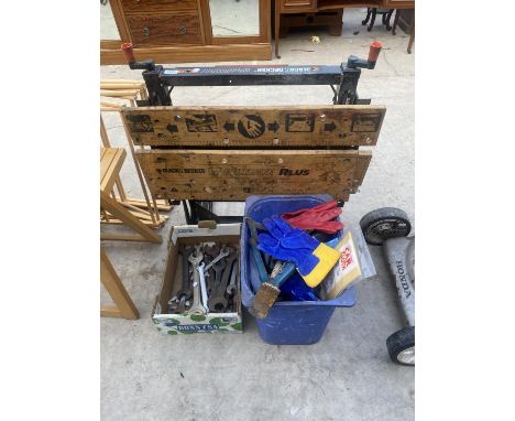 A COLLECTION OF TOOLS TO INCLUDE A WORK BENCH, SPANNERS AND JACK ETC 