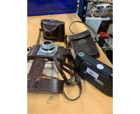 THREE VINTAGE CAMERAS WITH LEATHER CASES 