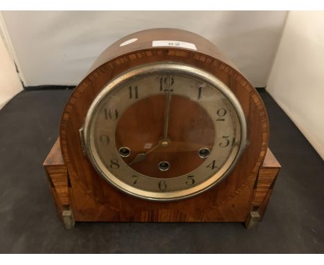 A VINTAGE WOODEN MANTEL CLOCK 