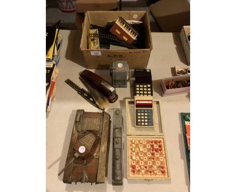 AN ASSORTMENT OF ITEMS TO INCLUDE MODEL OF A TANK, LEAD TRAIN, PENCIL SHARPENER, TRAIN TRACK ETC 