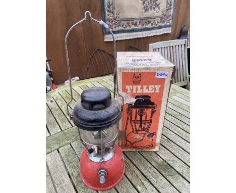 A VINTAGE TILLEY STORM LIGHT OIL LAMP 