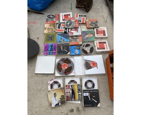 A COLLECTION OF VINTAGE RECORD REELS TO INCLUDE NAT KING COLE ETC 