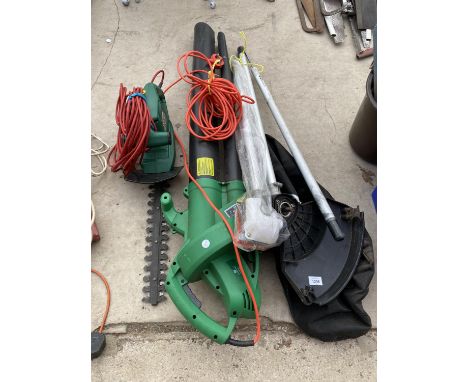 AN ASSORTMENT OF POWER GARDEN TOOLS TO INCLUDE A LEAF BLOWER, HEDGE CUTTER AND STRIMMER ATTACTHMENTS ETC 