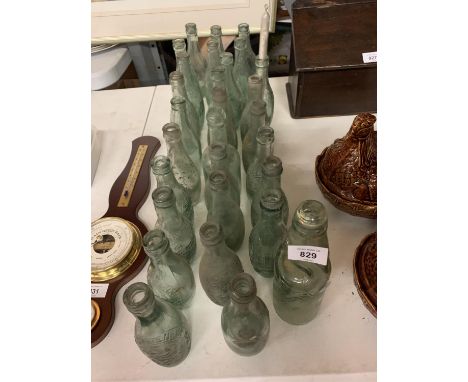 A LARGE QUANTITY OF VINTAGE GLASS BOTTLES 