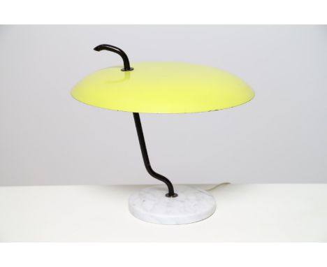 Attributed to. Table lamp. . Cm 40,00 x 37,00 x 40,00. Table lamp, 50s. Reflective dome in yellow lacquered brass, forged han