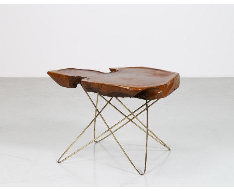 Coffe table. Wood and metal. Cm 81,00 x 53,00 x 51,50. Trunk table in root wood and golden lacquered metal, 50s. Publications