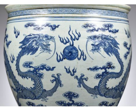 A LARGE BLUE AND WHITE ‘DRAGON’ JARDINIÃˆRE, QING DYNASTYPlease note this Lot is to be sold at No Reserve. 本拍品不設底價China, c. 1