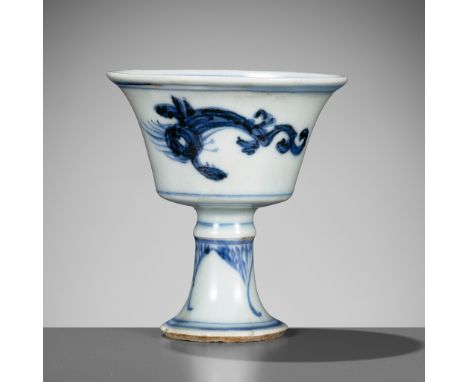 A BLUE AND WHITE ‘DRAGON’ STEM CUP, SECOND HALF OF THE MING DYNASTY 明代下半葉青花龍紋高足杯Please note this Lot is to be sold at No Rese