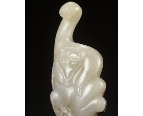 AN ARCHAISTIC WHITE JADE ‘BEAR’ GARMENT HOOK, QING DYNASTY 清代仿古白玉熊衣飾掛扣Please note this Lot is to be sold at No Reserve. 本拍品不設