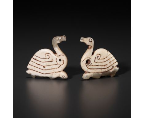 AN EXTREMELY RARE PAIR OF JADE ‘GEESE’ PENDANTS, SHANG DYNASTY 商代一對罕見玉鵝佩飾Please note this Lot is to be sold at No Reserve. 本拍