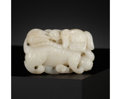 A WHITE JADE 'BUDDHIST LION' BELT BUCKLE, CHINA, 18TH CENTURY 中國十八世紀白玉佛獅帶鈎Please note this Lot is to be sold at No Reserve. 本