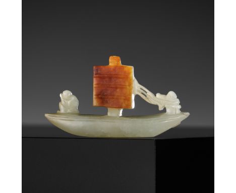 A PALE CELADON AND RUSSET JADE CARVING OF A SAILING BOAT, QING DYNASTY 清代青白玉雕帆船Please note this Lot is to be sold at No Reser