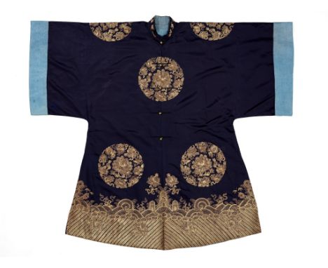 A WOMAN’S SILVER AND GOLD-EMBROIDERED SILK ROUNDEL ROBE, 19TH CENTURY 十九世紀石青地金銀刺綉團花紋外袍  Please note this Lot is to be sold at