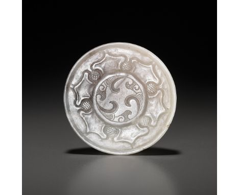 A PALE CELADON JADE SWORD POMMEL, WESTERN HAN DYNASTY 西漢青白玉劍首Please note this Lot is to be sold at No Reserve. 本拍品不設底價China, 