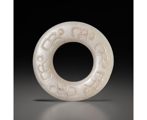 A JADE RING, HUAN, EASTERN ZHOU DYNASTY 東周玉環Please note this Lot is to be sold at No Reserve. 本拍品不設底價China, 7th-4th century B