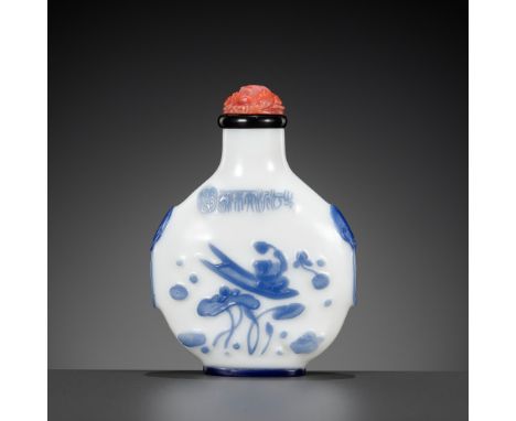 AN INSCRIBED SAPPHIRE-BLUE OVERLAY GLASS SNUFF BOTTLE, YANGZHOU SCHOOL, CHINA, 1800-1880Please note this Lot is to be sold at