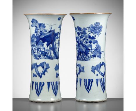 A PAIR OF BLUE AND WHITE ‘MAGNOLIA’ BEAKER VASES, TRANSITIONAL PERIOD 明清過渡時期一對青花玉蘭花紋花觚Please note this Lot is to be sold at N