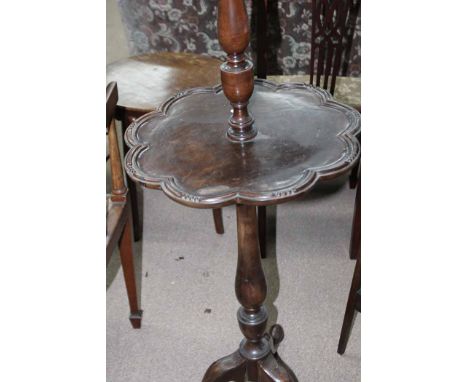 MAHOGANY STANDARD LAMP with tripod supports and table midstage and an occasional table