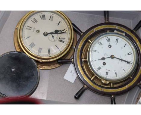 BRASS SHIP'S BULKHEAD CLOCK BY SESTREL
the 14cm dial with Roman numerals; together with a brass barometer and a Schatz Royal 