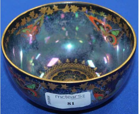 DEVON FIELDINGS RURAL LUSTRINE BUTTERFLY BOWL
with blue ground and gilt detail with red and green enamel, 12cm in diameter