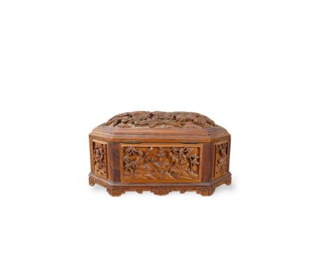 A Carved Chinese Export Wood Casket and Cover, 19th century,  probably a tea caddy, of canted rectangular form, with hinged s