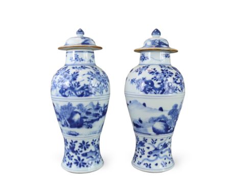 A Pair of Blue and White Vases and Covers, Kangxi of slender baluster form, well painted around the waist in good blue with s