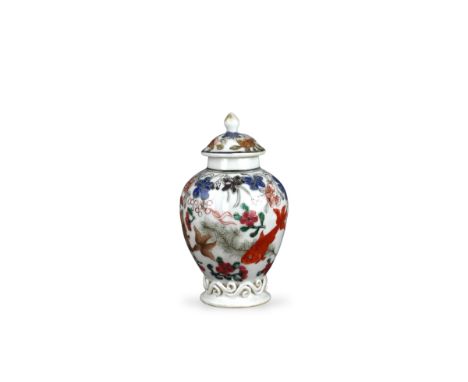 A 'famille rose' Tea Caddy and Cover with Goldfish, Yongzheng, of lobed shouldered form with the fish swimming among waterwee