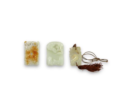 Three Jade Pendants, 19th/20th century,  comprising a rectangular double phoenix plaque, a celadon jade plaque with dragon an