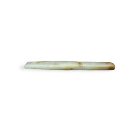 An Archaic Jade Ornament, Shang/Early Western Zhou dynasty, probably a fish, of long slender form and flattened rectangular s