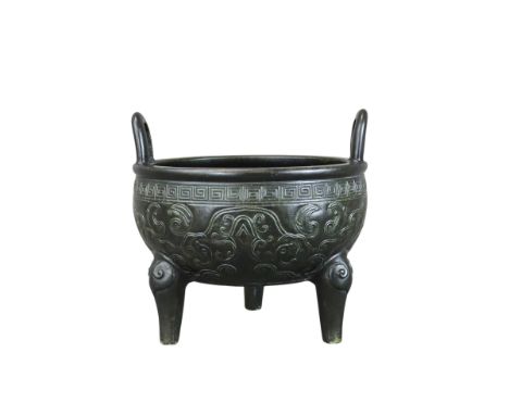 A Rare Black Glazed Tripod Censer, liding, incised seal mark Xiyin Shuwu zhencang, Jiaqing period,  imitating an archaic bron