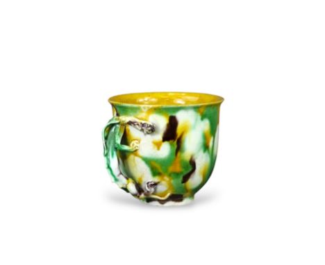 An 'Egg and Spinach' Winecup, Kangxi, of deep rounded form with moulded chilong loop handle, covered overall in splashed yell