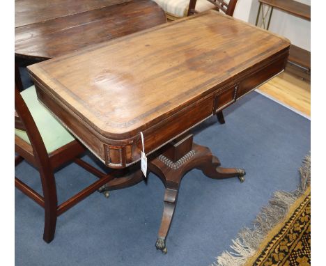 A late Regency mahogany folding card table W.92cm